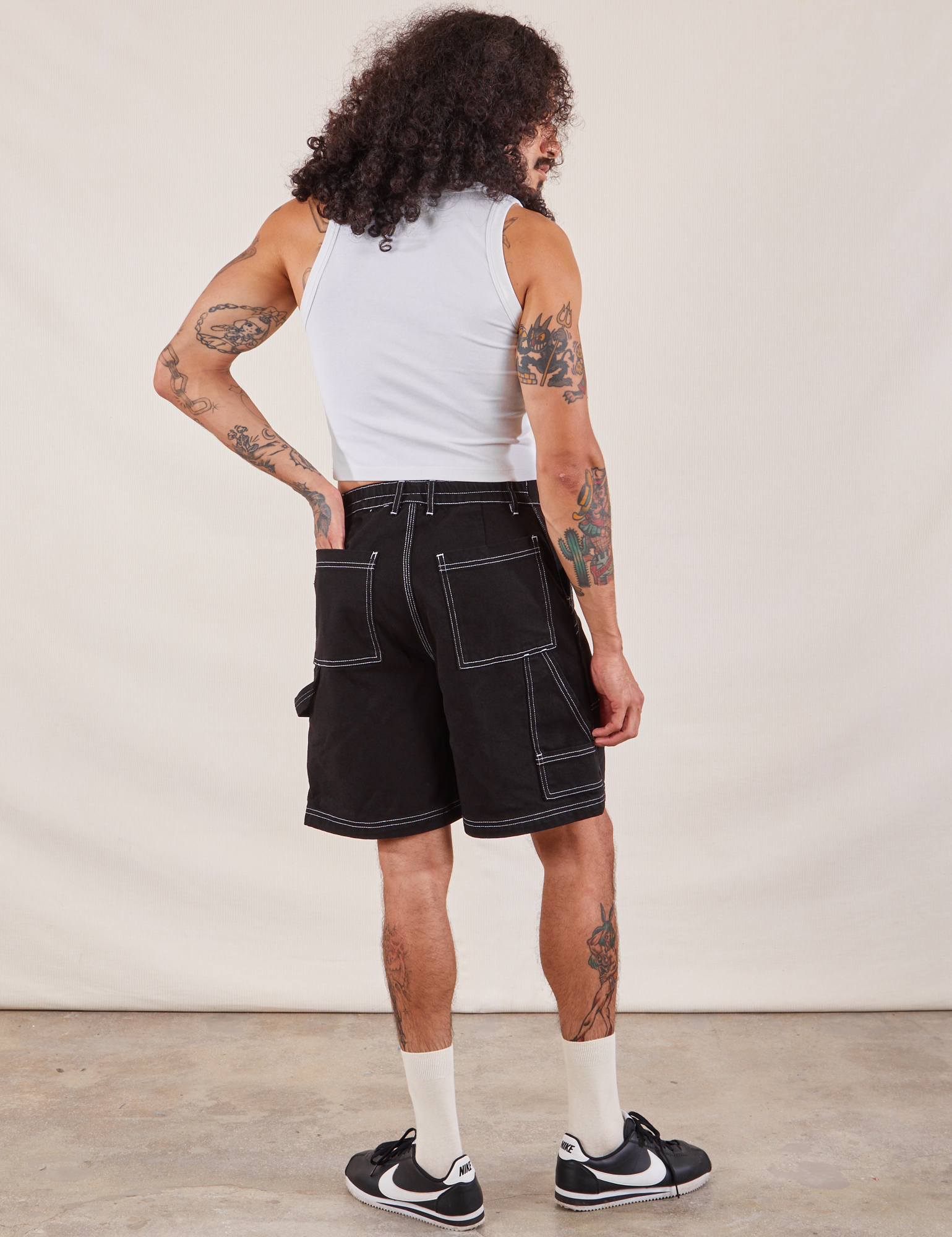 Back view of Carpenter Shorts in Basic Black and Cropped Tank in vintage tee off-white on Jesse