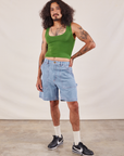 Jesse is 5'8" and wearing S Carpenter Shorts in Light Wash paired with lawn green Cropped tank