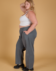 Side view of Baggy Mid-Rise Trousers in Slate Grey and Cropped Tank in Vintage Tee White on Juliet