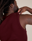 Back shoulder close up of Muscle Tee in Red Wine on Demi