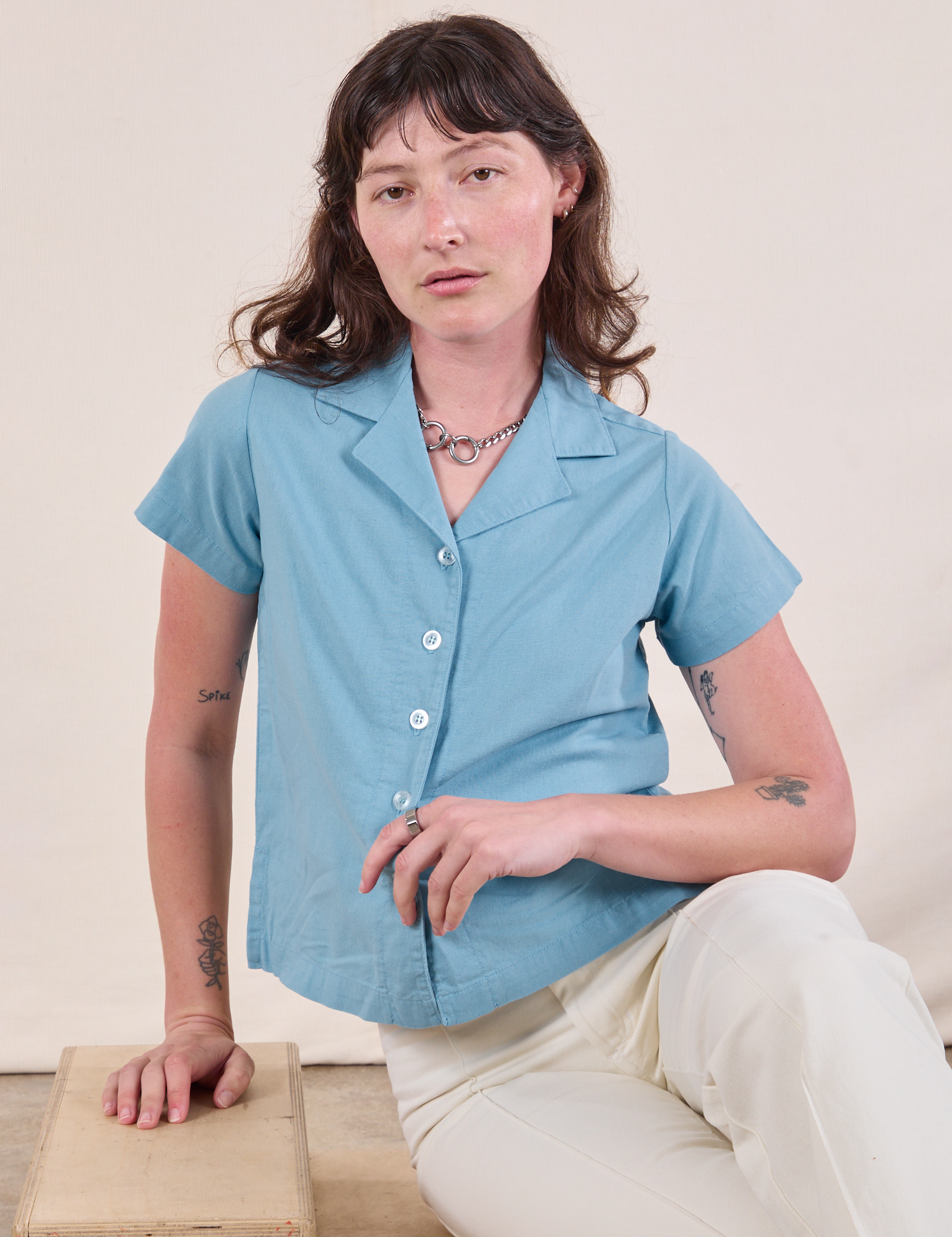 Alex is wearing Pantry Button-Up in Baby Blue
