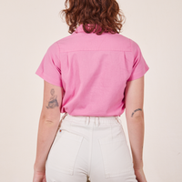 Back view of Pantry Button-Up in Bubblegum Pink worn by Alex