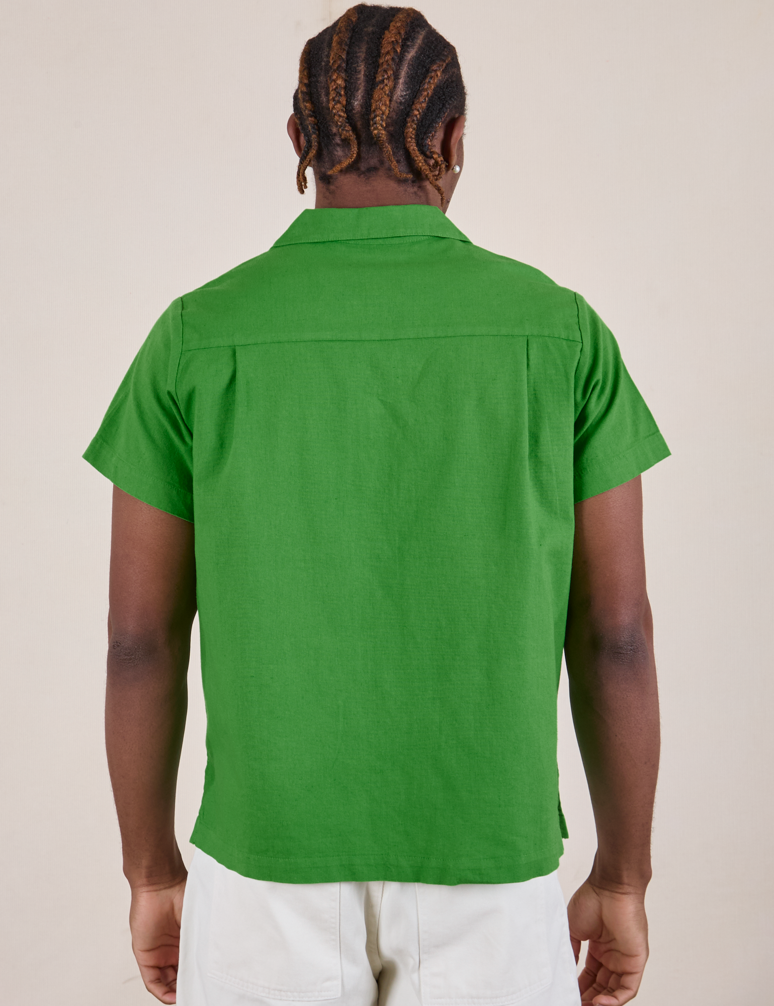 Pantry Button-Up in Kelly Green back view on Isaac