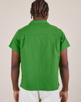 Pantry Button-Up in Kelly Green back view on Isaac