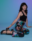 Alex is wearing Work Pants in Rainbow Magic Waters and black Cropped Tank
