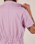Short Sleeve Jumpsuit in Lilac back close up on Anthony