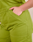Short Sleeve Jumpsuit in Gross Green front pocket close up