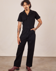 Jesse is wearing Short Sleeve Jumpsuit in Basic Black