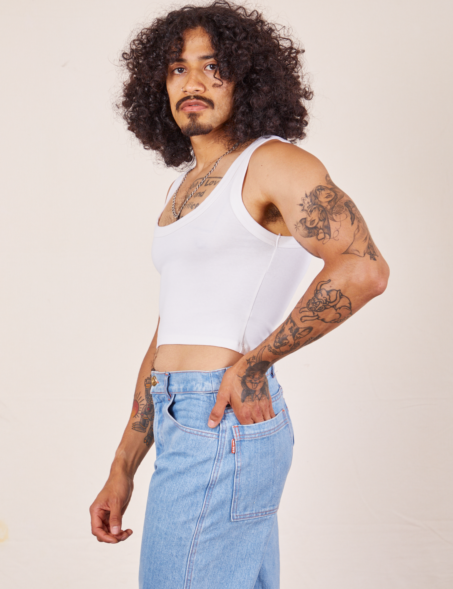 Side view of Cropped Tank Top in Vintage Tee Off-White worn by Jesse