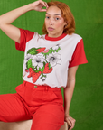 Tiara is wearing Anniversary Tee in Strawbaby