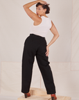 Back view of Denim Trouser Jeans in Black and Tank Top in vintage Tee off-white worn by Tiara