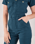 Heritage Short Sleeve Jumpsuit in Lagoon close up on Alex
