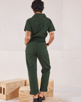 Heritage Short Sleeve Jumpsuit in Swamp Green back view on Mika