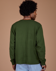 Long Sleeve Burly Tee in Evergreen back view on Jerrod
