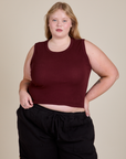 Juliet is 5'7" and wearing L Muscle Tee in Red Wine