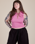Sydney is 5'9" and wearing XXS Muscle Tee in Bubblegum Pink