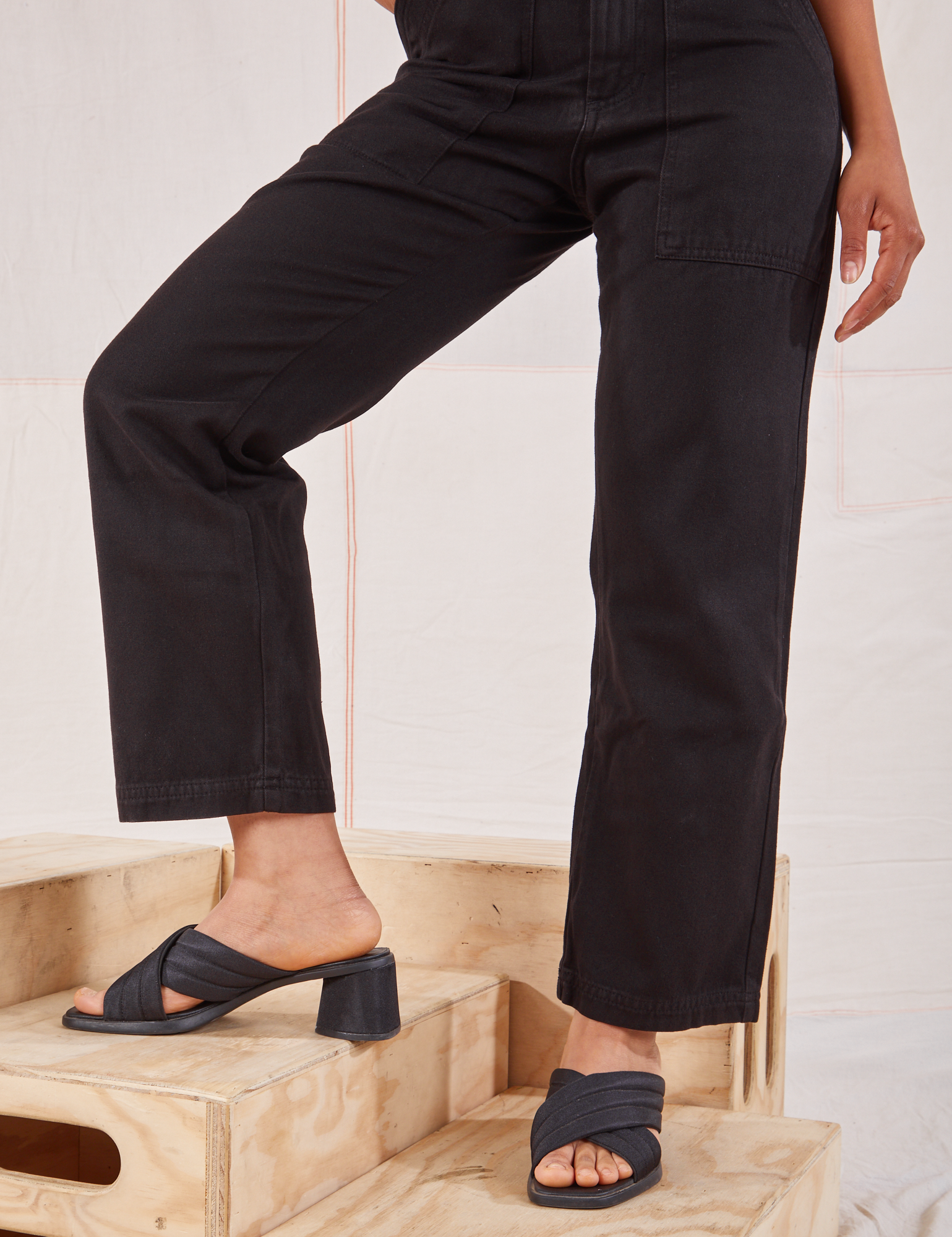 Organic Work Pants in Basic Black pant leg close up on Mika