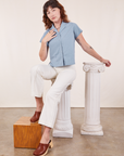 Alex is wearing Pantry Button-Up in Periwinkle and vintage tee off-white Western Pants