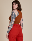 Racerback Tank in Burnt Terracotta angled back view on Sydney