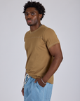 Jr. Varsity Tee in Desert Brown side view on Isaac