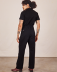 Back view of Short Sleeve Jumpsuit in Basic Black worn by Jesse