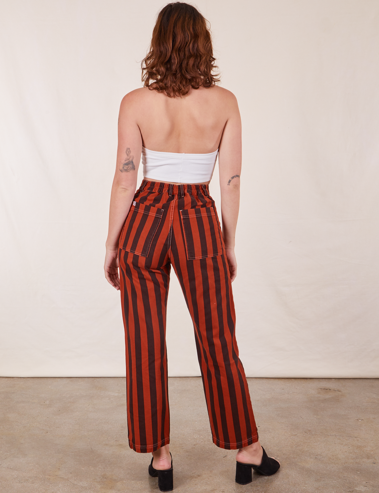 Back view of Black Striped Work Pants in Paprika on Alex