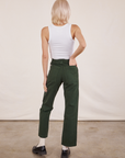 Back view of Work Pants in Swamp Green and Cropped Tank Top in vintage tee off-white on Madeline
