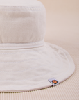 Wide Brim Denim Bucket Hats in Vintage Tee Off-White close up