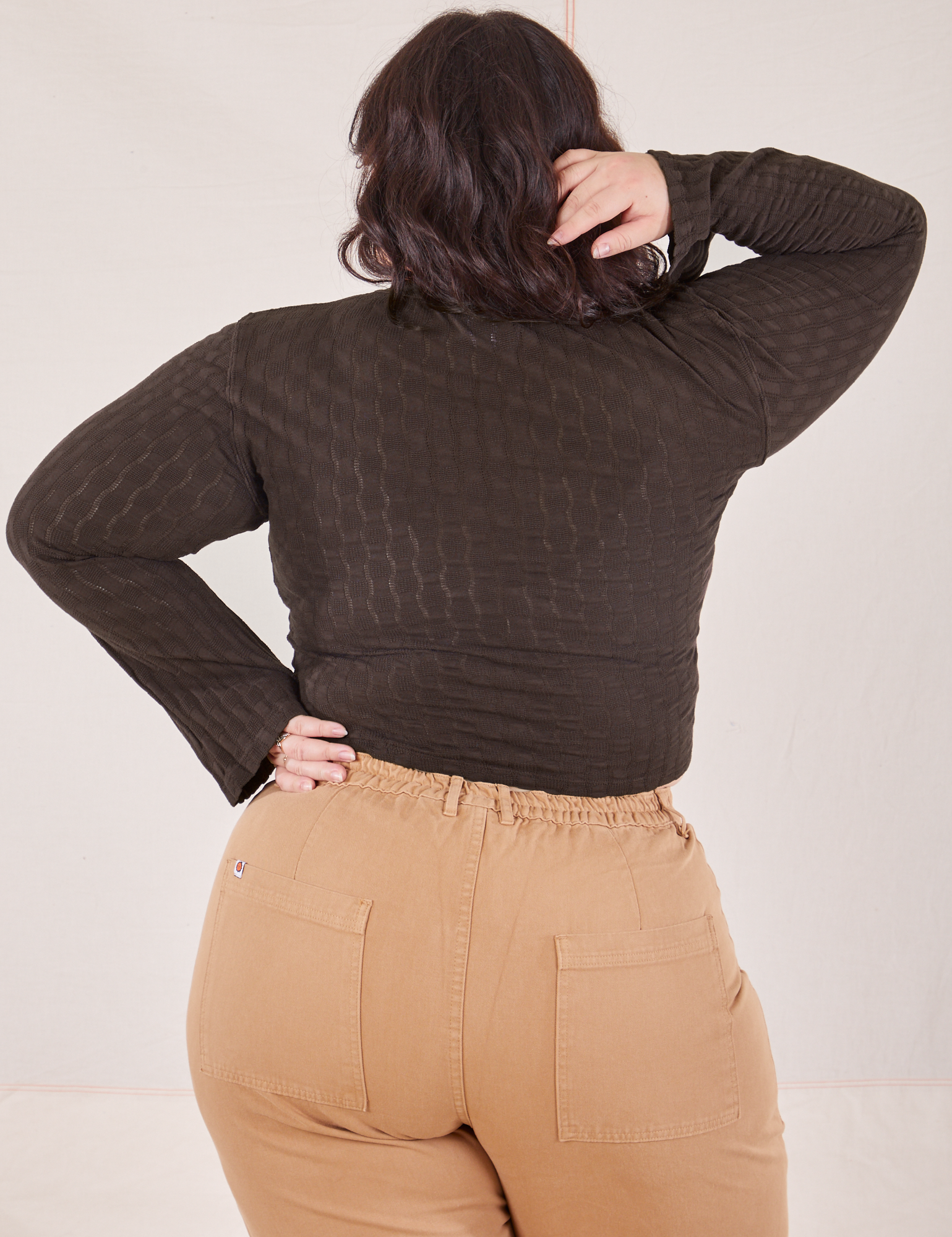 Back view of Bell Sleeve Top in Espresso Brown and tan Work Pants worn by Ashley