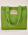 Shopper Tote Bag in Bright Olive with straps hanging down front of bag