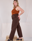 Side view of Overdyed Denim Trouser in Fudge on Lish