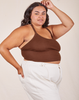 Angled side view of Halter Top in Fudgesicle Brown and vintage off-white Western Pants worn by Alicia