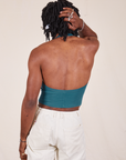 Back view of Halter Top in Marine Blue and vintage off-white Western Pants worn by Jerrod
