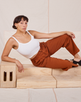 Tiara is wearing Heavyweight Trousers in Burnt Terracotta and Cropped Cami in vintage tee off-white
