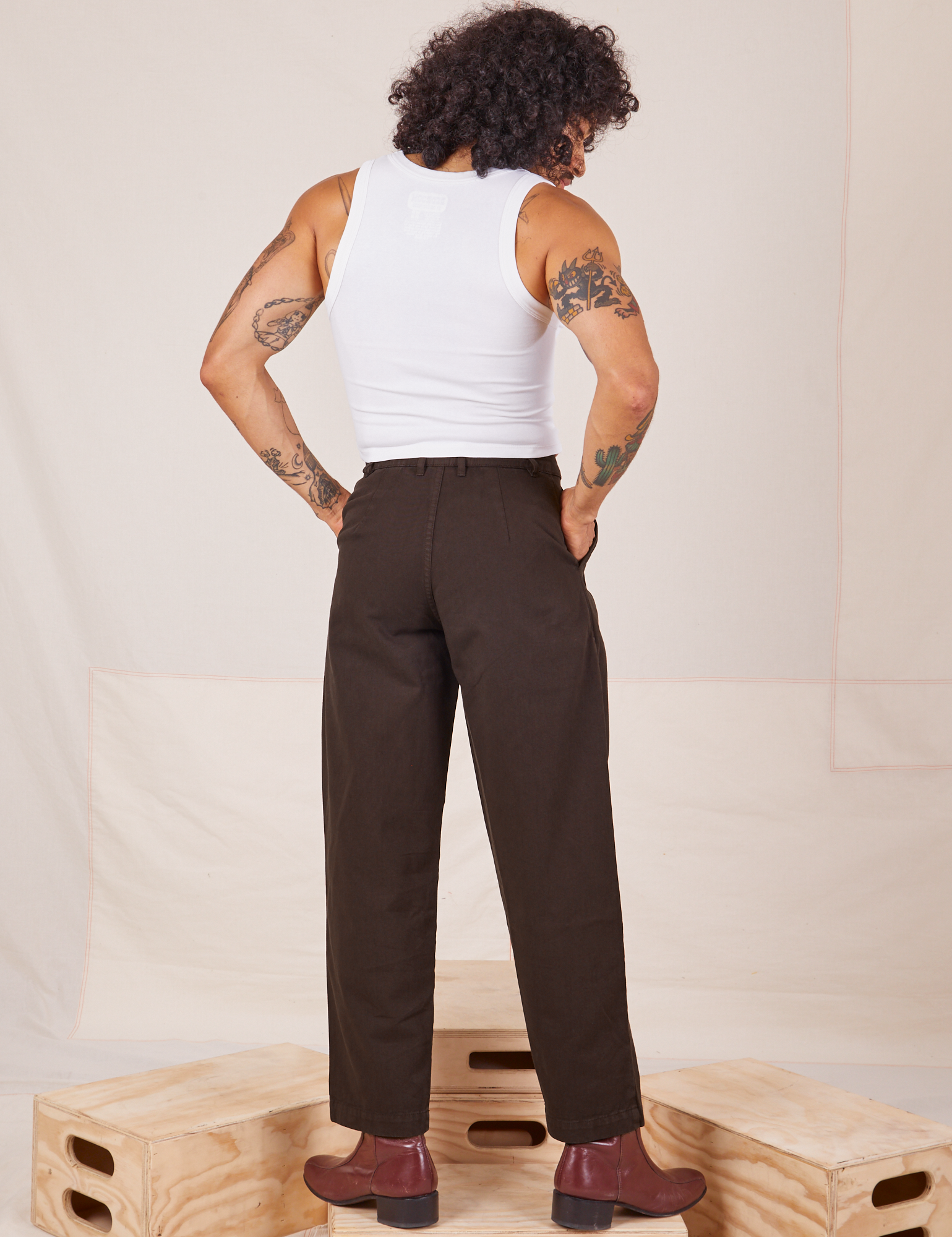 Back view of Heavyweight Trousers in Espresso Brown and Cropped Tank Top in vintage tee off-white