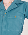 Front close up of Heritage Short Sleeve Jumpsuit in Marine Blue worn by Alex
