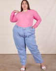 Marielena is wearing Honeycomb Thermal in Bubblegum Pink tucked into light wash Denim Trousers