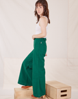 Side view of Bell Bottoms in Hunter Green worn by Hana