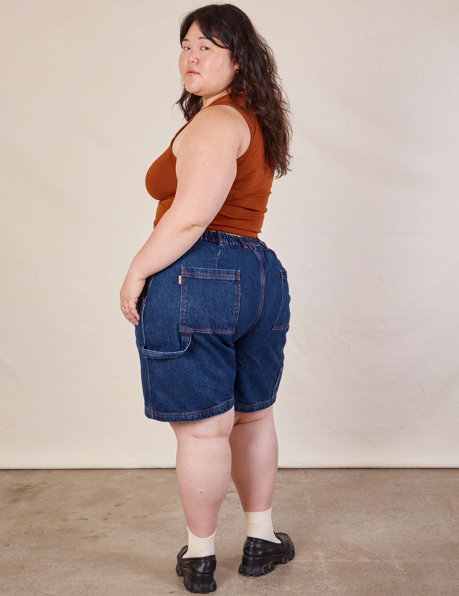 Carpenter Shorts in Dark Wash back view on Ashley