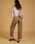 Baggy Mid-Rise Trousers in Desert Brown back view on Alex