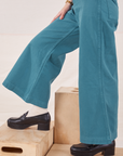 Petite Bell Bottoms in Marine Blue pant leg side view close up on Hana