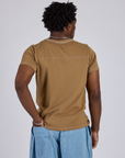 Jr. Varsity Tee in Desert Brown back view on Isaac