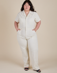 Ashley is 5'7" and wearing 1XL Short Sleeve Jumpsuit in Vintage Tee White