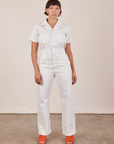 Tiara is 5'4" and wearing S Short Sleeve Jumpsuit in Vintage Tee Off-White