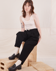 Hana is wearing Organic Trousers in Basic Black and Tank Top in vintage tee off-white