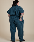 Short Sleeve Jumpsuit in Lagoon back view on Sam