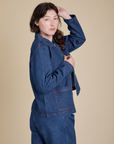Side view of Indigo Denim Work Jacket in Dark Wash on Alex