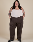 Sam is 5’10” and wearing 4XL Work Pants in Espresso Brown paired with a Tank Top in Vintage Tee Off-White