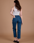 Carpenter Jeans in Dark Wash back view on Alex