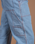 Carpenter Jeans in Light Wash pant leg side view close up